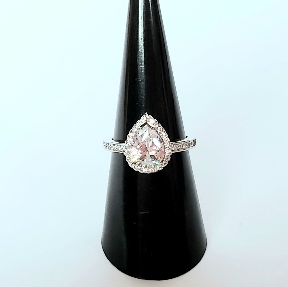 Halo pear engagement ring silver white